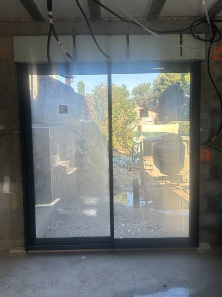 pose baie coulissante double vitrage