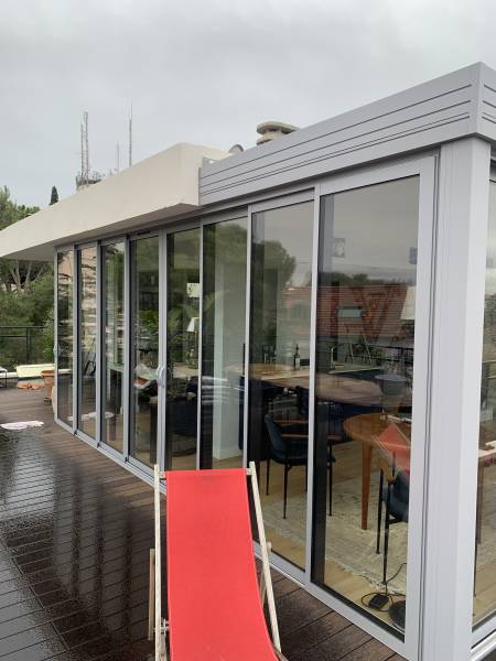 Pose d'une véranda sur un toit terrasse à Périer, dans le 8ème arrondissement de Marseille