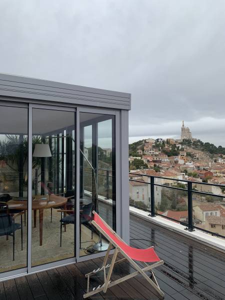 Pose d'une véranda sur un toit terrasse à Périer, dans le 8ème arrondissement de Marseille
